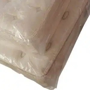 a mattress wrapped up for storage