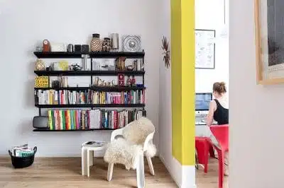 wall shelf in an apartment with items on it