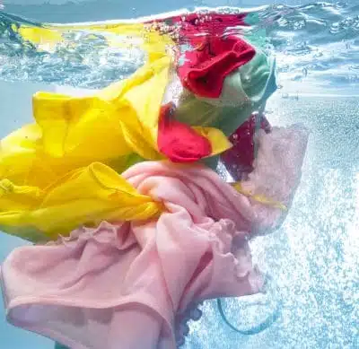 Summer clothes being washed before being stored