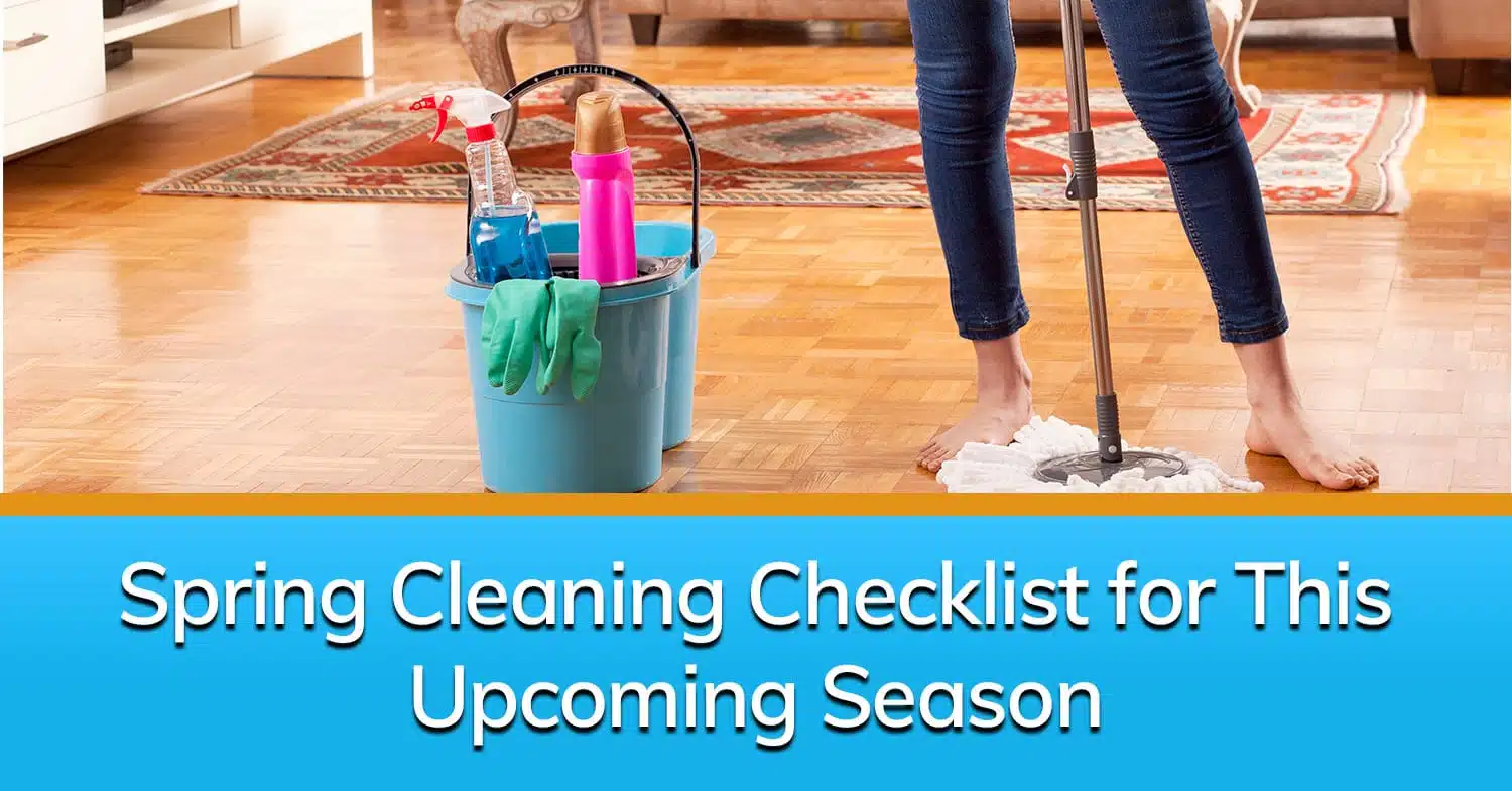 A person with a cleaning bucket, cleaning supplies, gloves, and a mop, ready to get into spring cleaning.