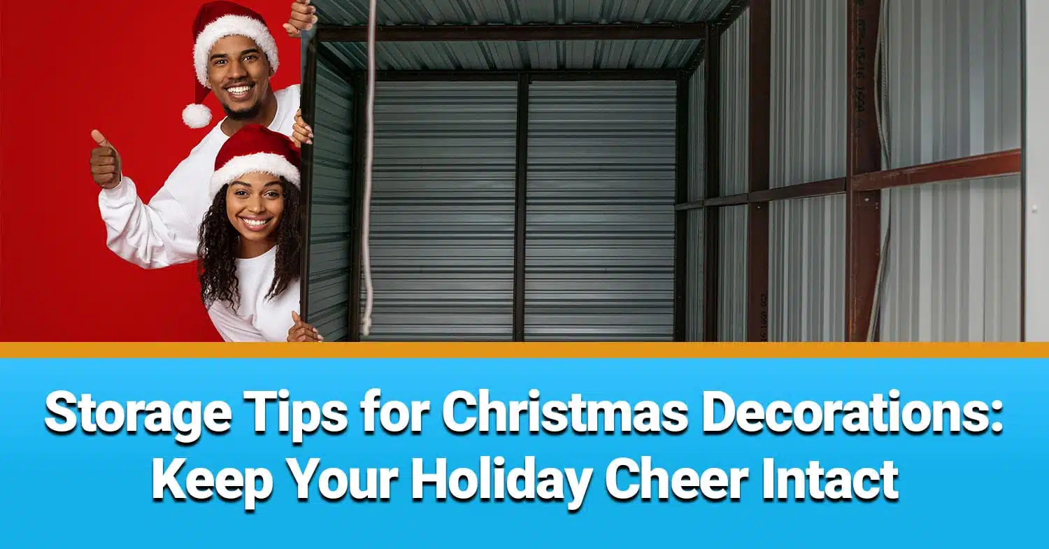 Couple wearing santa hats presenting inside a storage unit